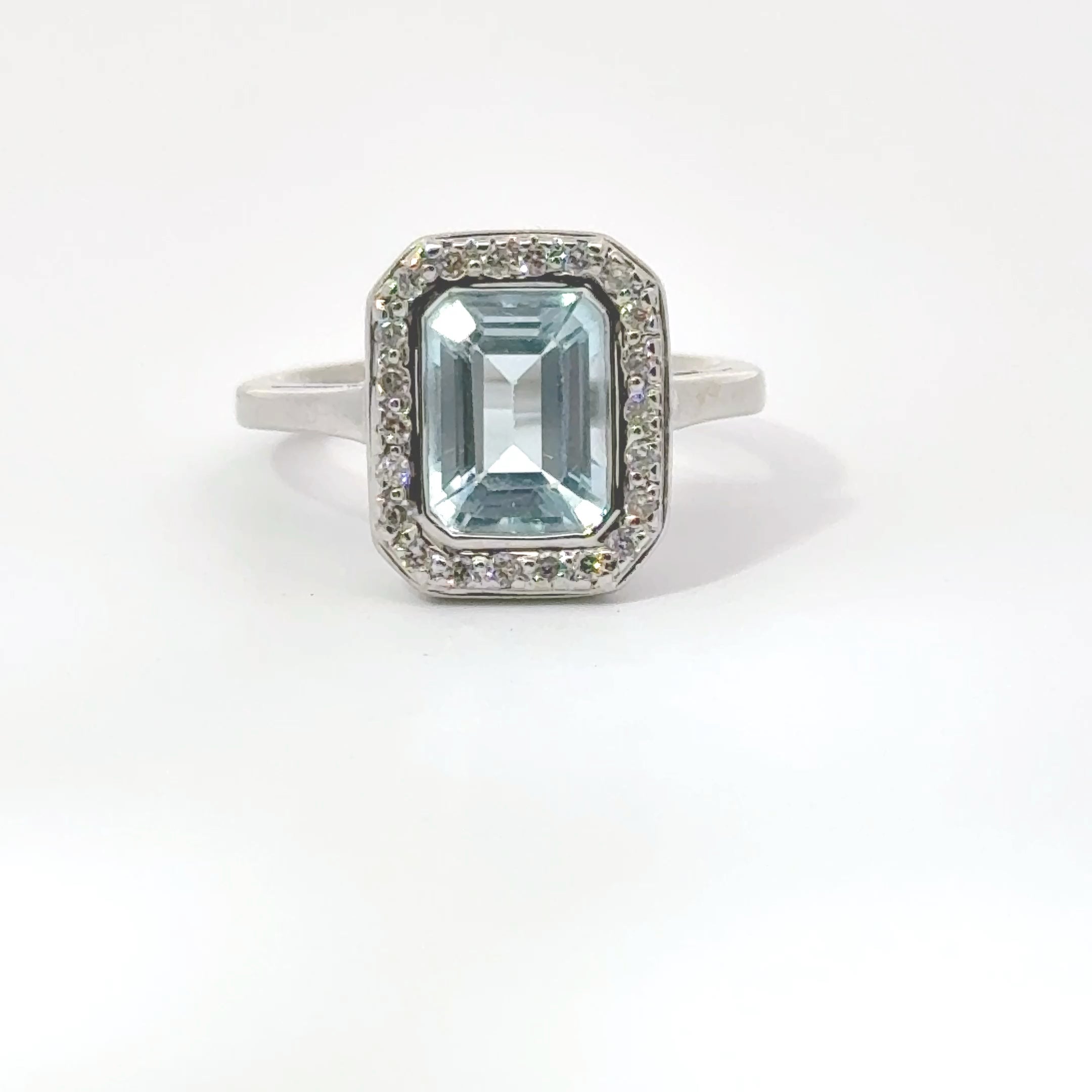 Stunning 2 Ct Emerald-Cut Aquamarine Ring with Diamond Halo